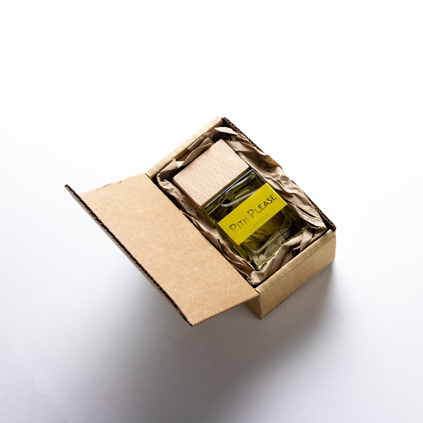 DRYF's Pith Please fragrance, a vibrant citrus blend with notes of blood orange, lime, creamy santal, and vanilla, perfect for refreshing your senses all packaged in an eco friendly box.