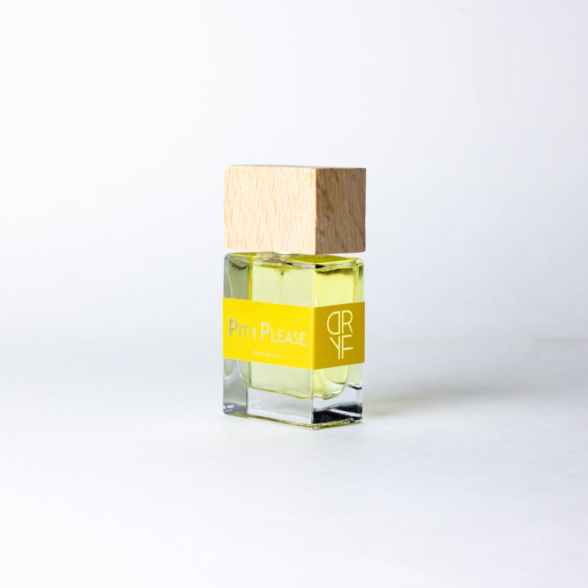 Unisex fragrance Pith Please by DRYF, featuring bright citrus notes of blood orange and lime with a warm base of santal and vanilla.
