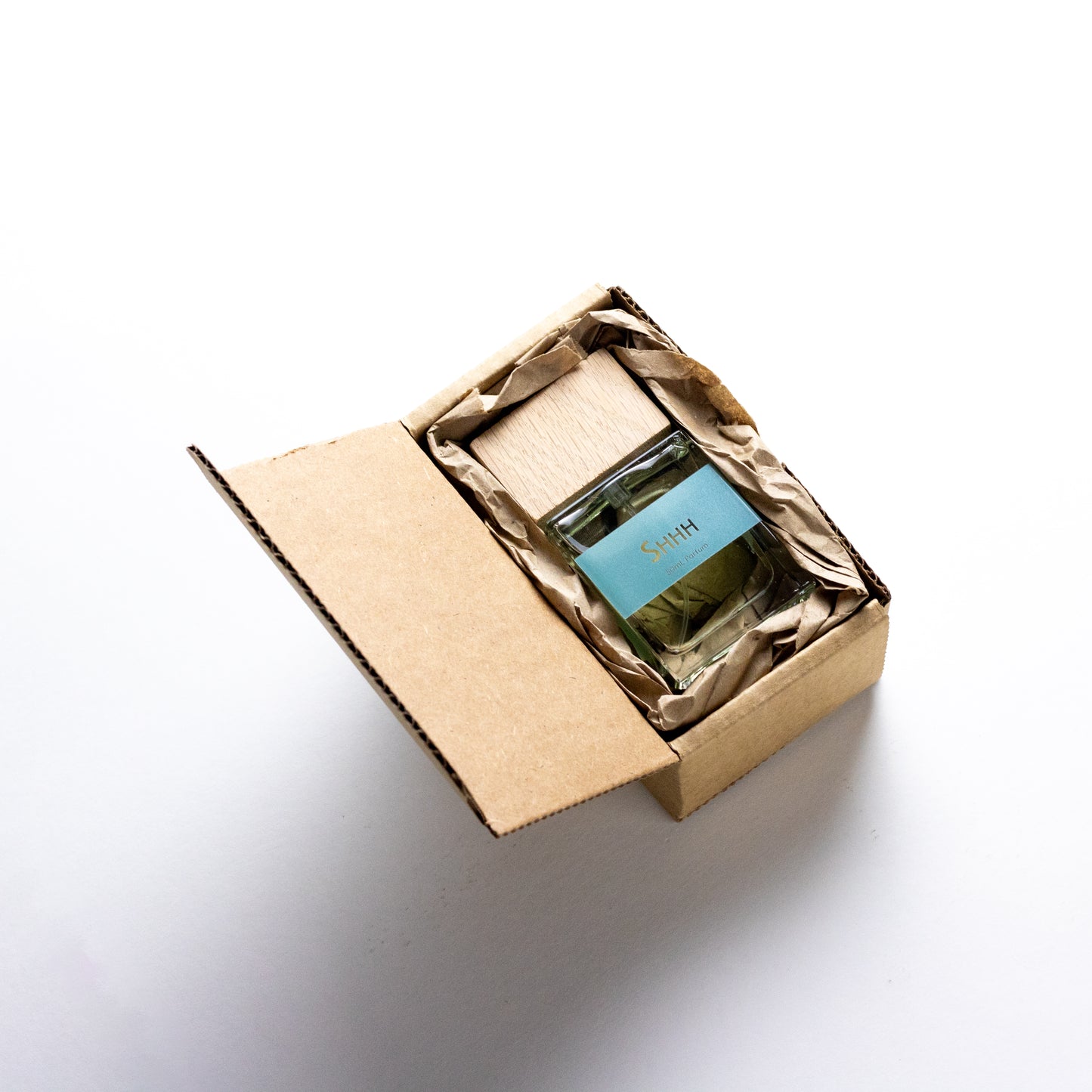 Shhh by DRYF, a sensory escape fragrance blending sea salt, coconut, and amber, creating a calm, unisex scent for relaxation all packaged up in an eco friendly box.