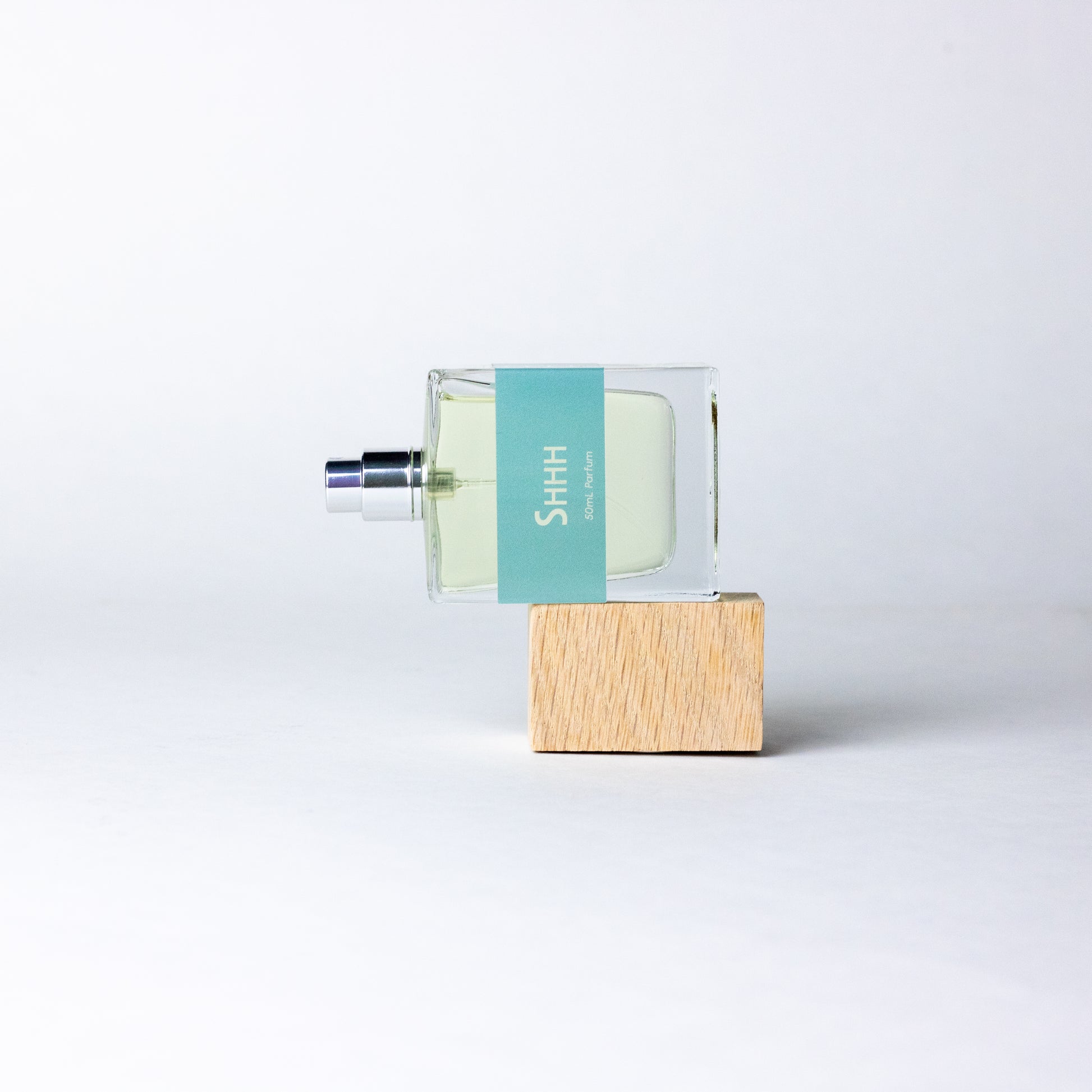 DRYF's Shhh fragrance, a peaceful escape with fresh sea salt, coconut, and warm santal notes, inspired by serene coastal moments.