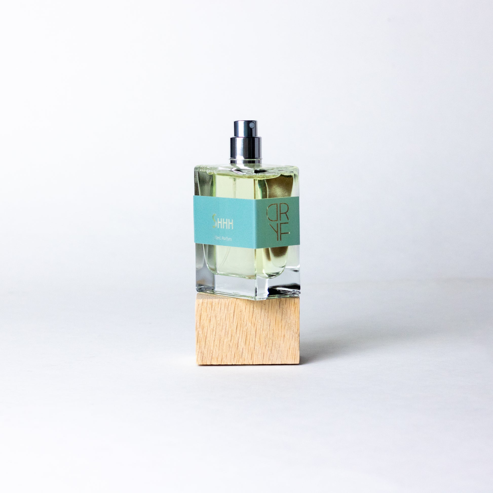 Handcrafted unisex fragrance Shhh by DRYF, capturing the calming essence of the ocean with sea salt, coconut, and smooth amber.