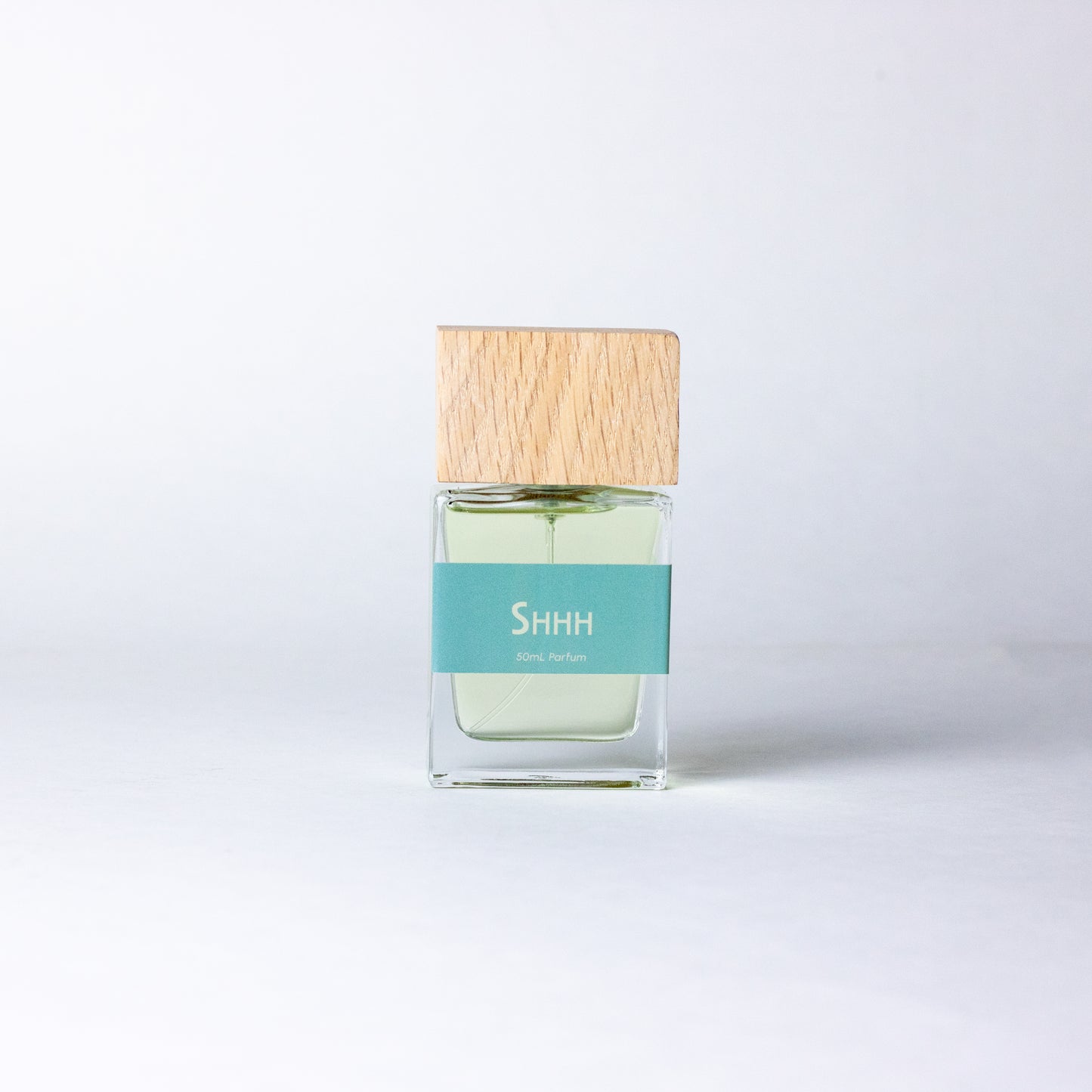 Shhh by DRYF, a handcrafted unisex fragrance blending sea salt, creamy coconut, santal, and amber for a calming, ocean-inspired scent.