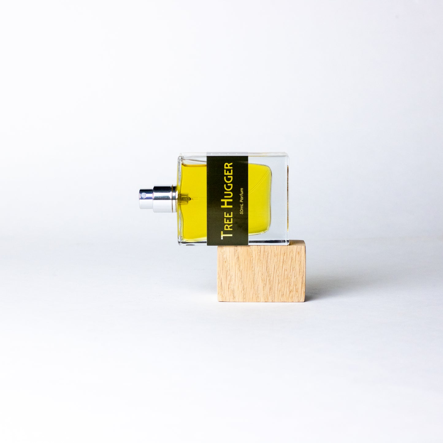 Tree Hugger by DRYF, a grounding unisex fragrance blending sandalwood, fir balsam, and rosemary for an earthy, nature-inspired scent.