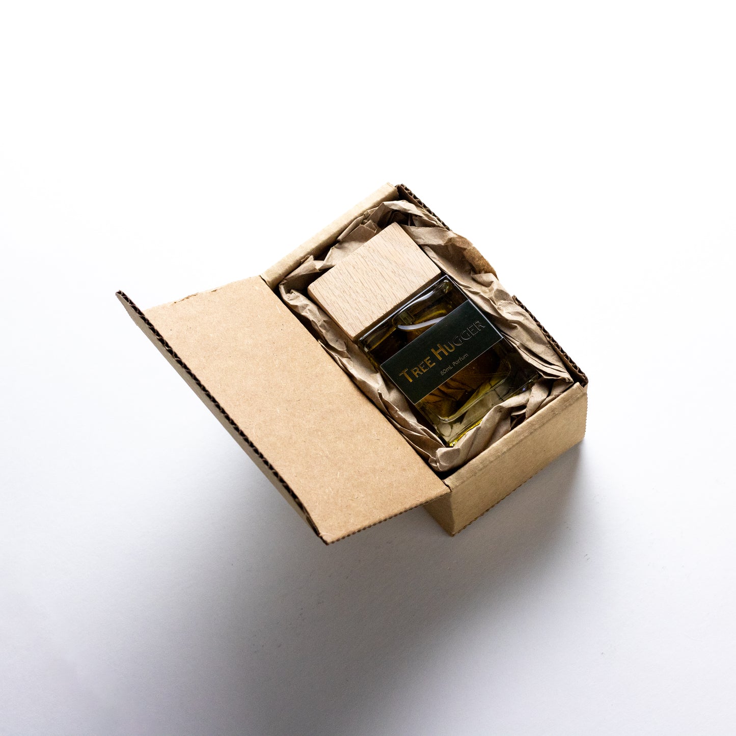 DRYF's Tree Hugger fragrance, a tribute to the forest with sandalwood, rosemary, and patchouli, offering a serene and grounding unisex scent.