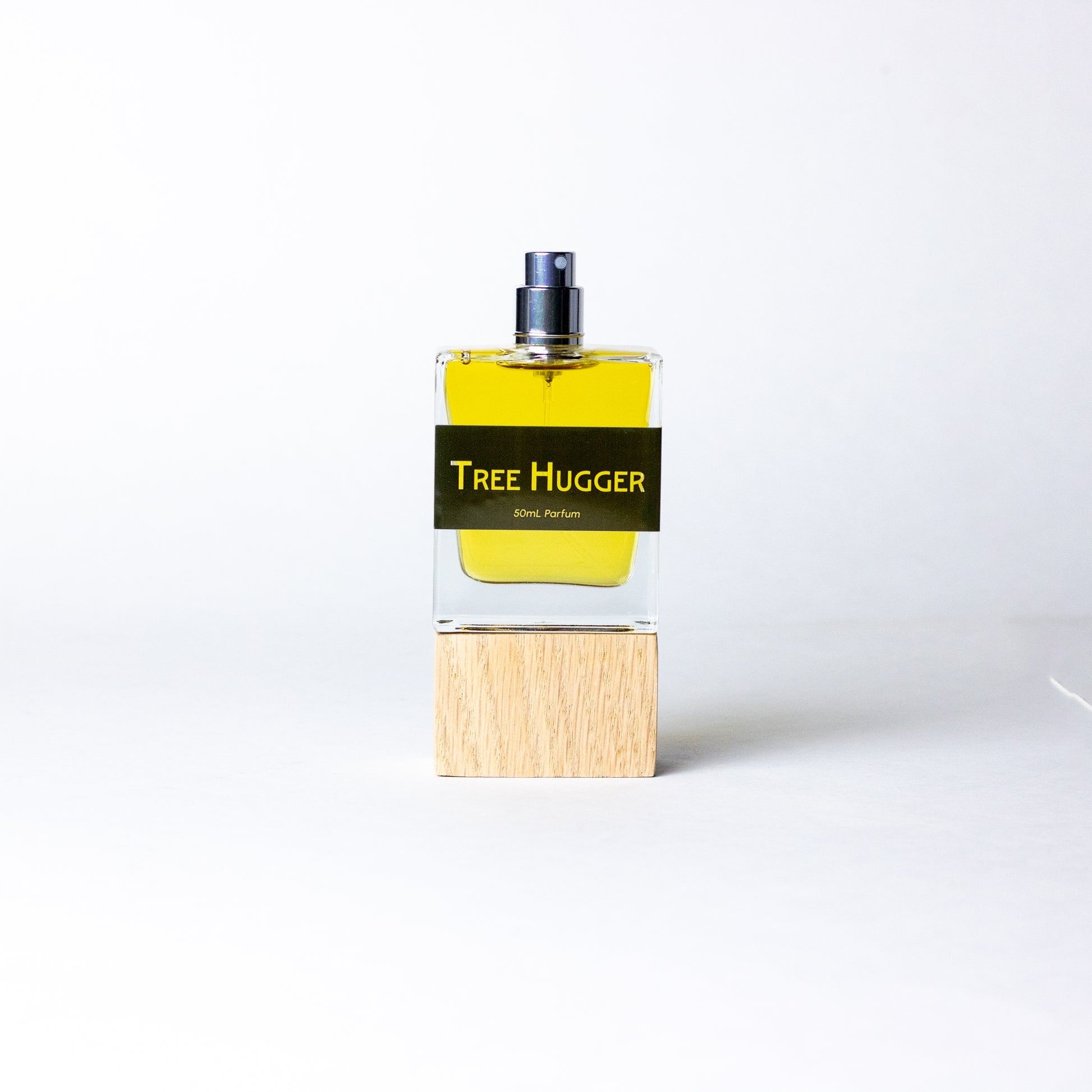 Tree Hugger by DRYF, an earthy fragrance combining sandalwood, fir balsam, and herbal rosemary with the grounding essence of patchouli.